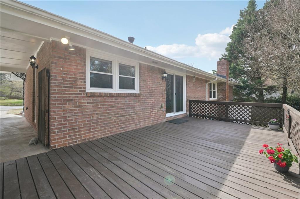 3112 Galangale Way Atlanta, GA 30340 - Photo 24 of 28 a backyard of a house with wooden floor