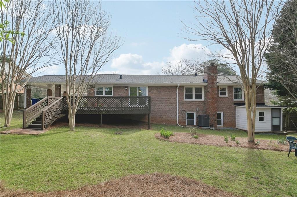 3112 Galangale Way Atlanta, GA 30340 - Photo 26 of 28 a view of a house with a yard and sitting area