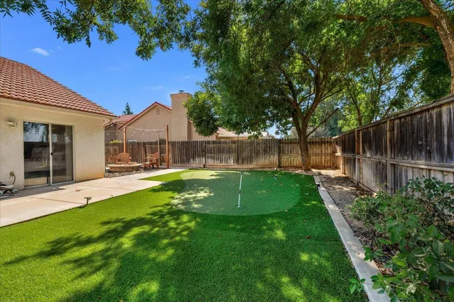a chairs and table in a patio