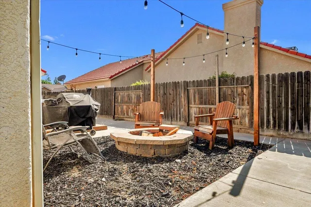 a view of a terrace with sitting area