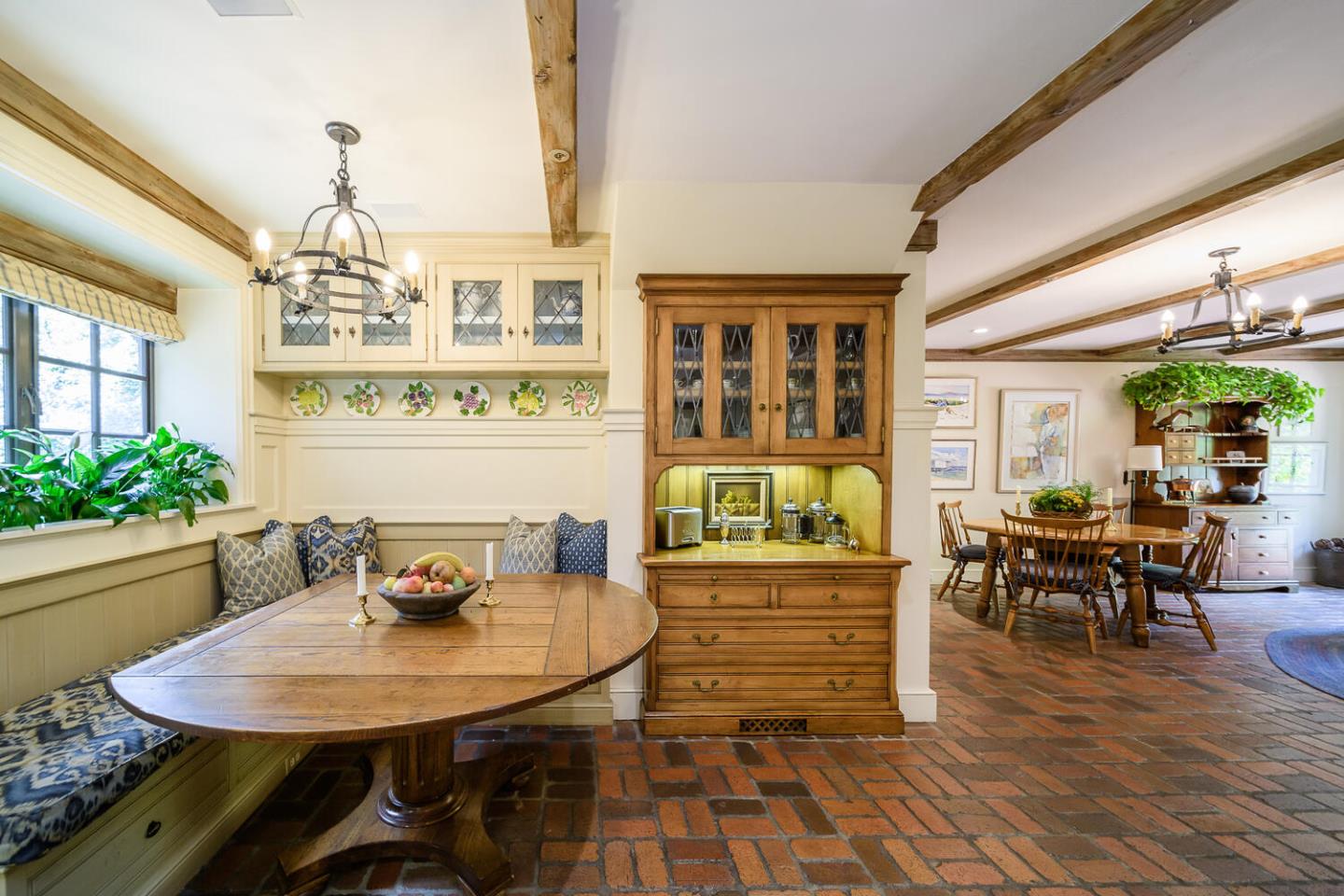 100 Robin Road Hillsborough, CA 94010 - Photo 17 of 90 a view of a dining room with furniture and wooden floor