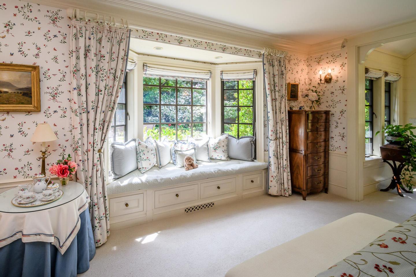 100 Robin Road Hillsborough, CA 94010 - Photo 24 of 90 a living room with furniture and a flat screen tv
