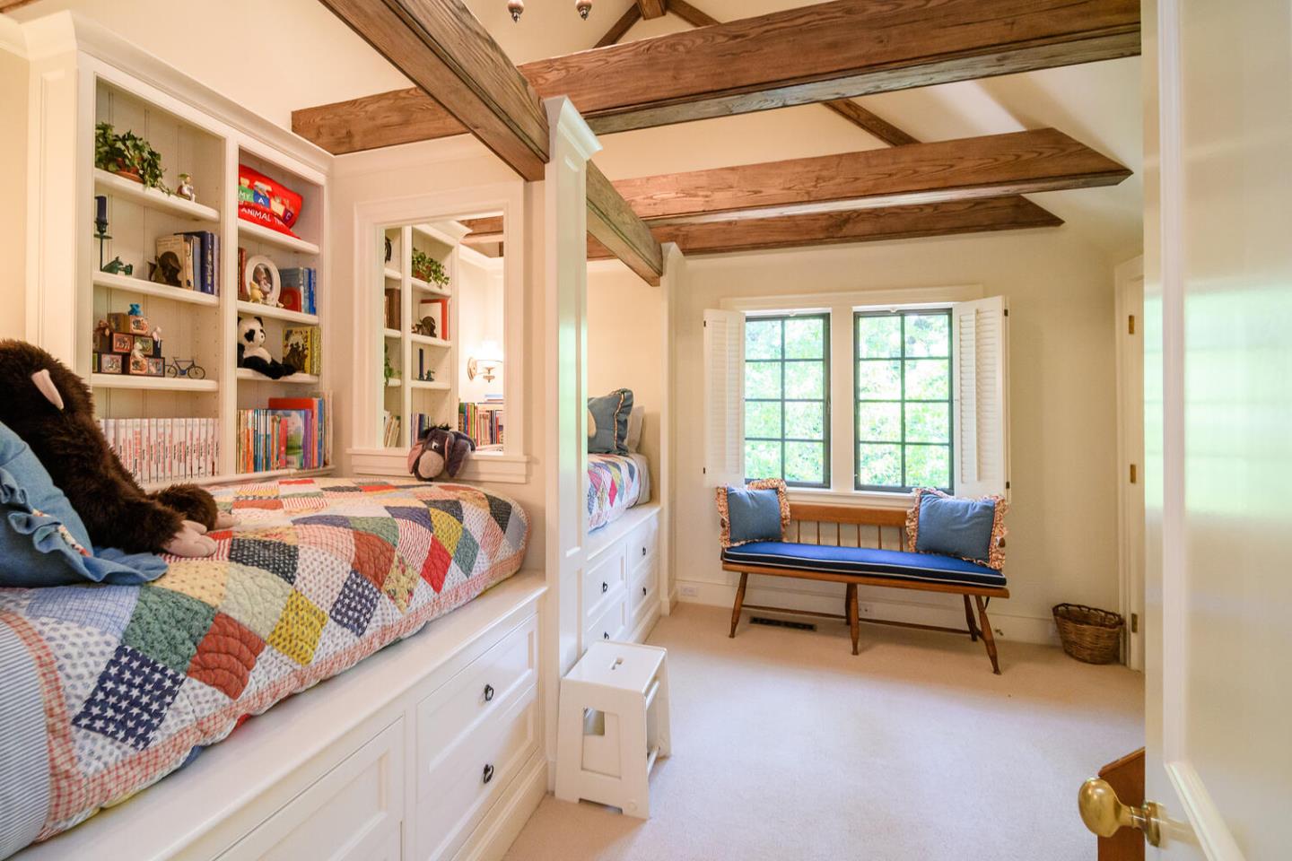 100 Robin Road Hillsborough, CA 94010 - Photo 43 of 90 a bedroom with a bed and a large window with rug