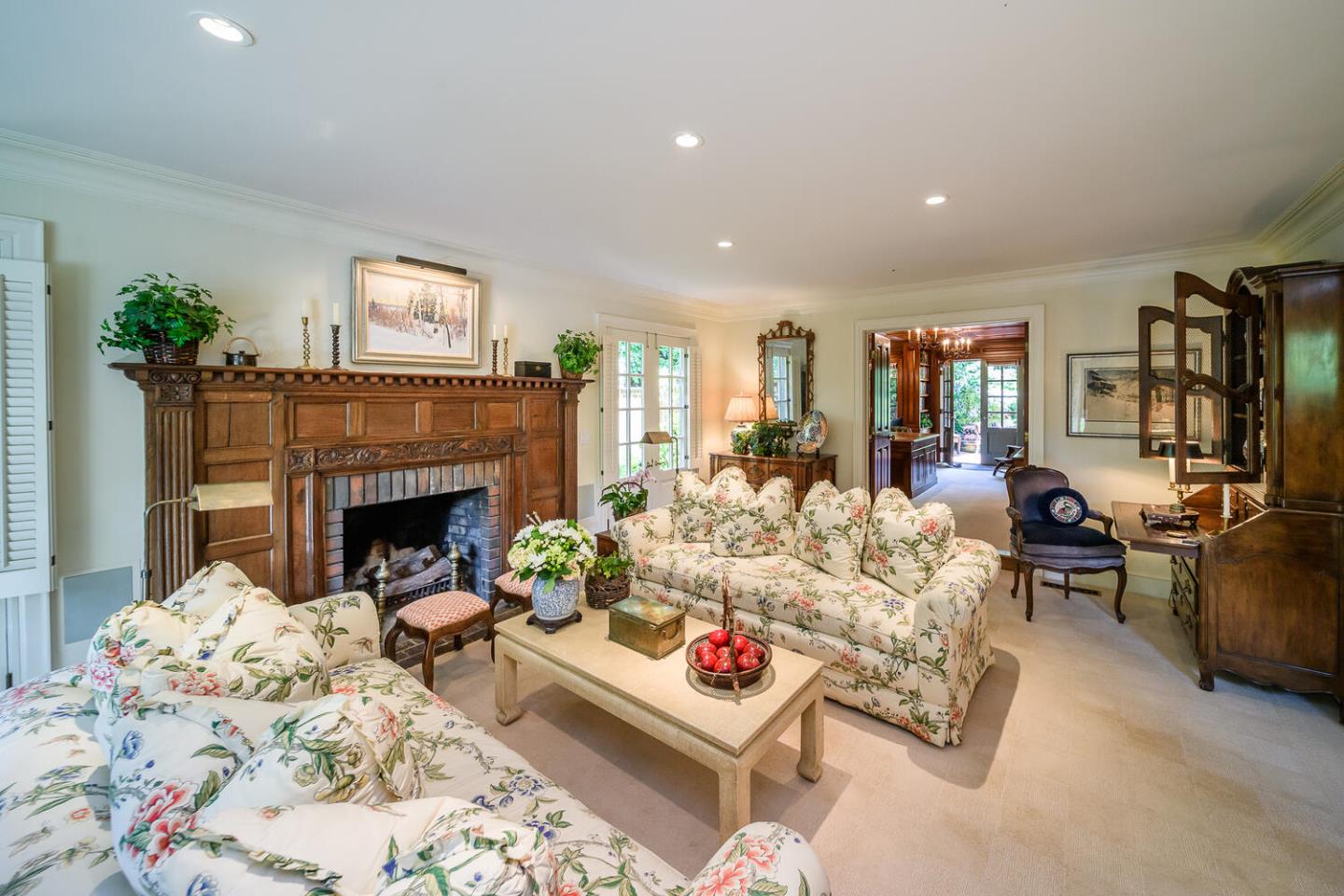 100 Robin Road Hillsborough, CA 94010 - Photo 6 of 90 a living room with furniture and a fireplace