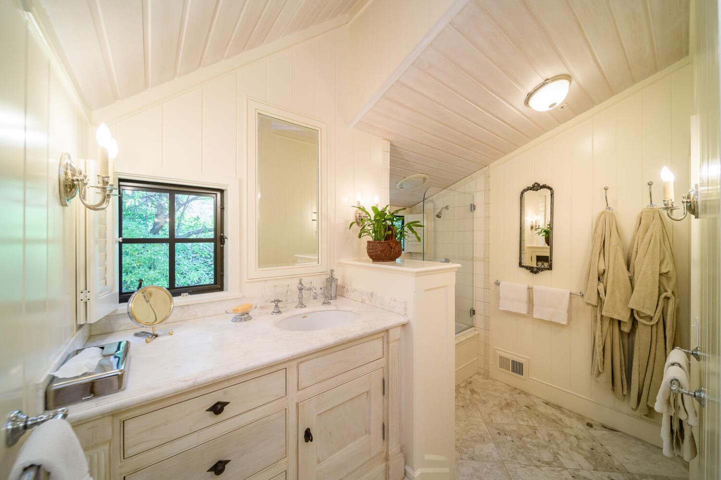 100 Robin Road Hillsborough, CA 94010 - Photo 52 of 90 a bathroom with a double vanity sink mirror and double