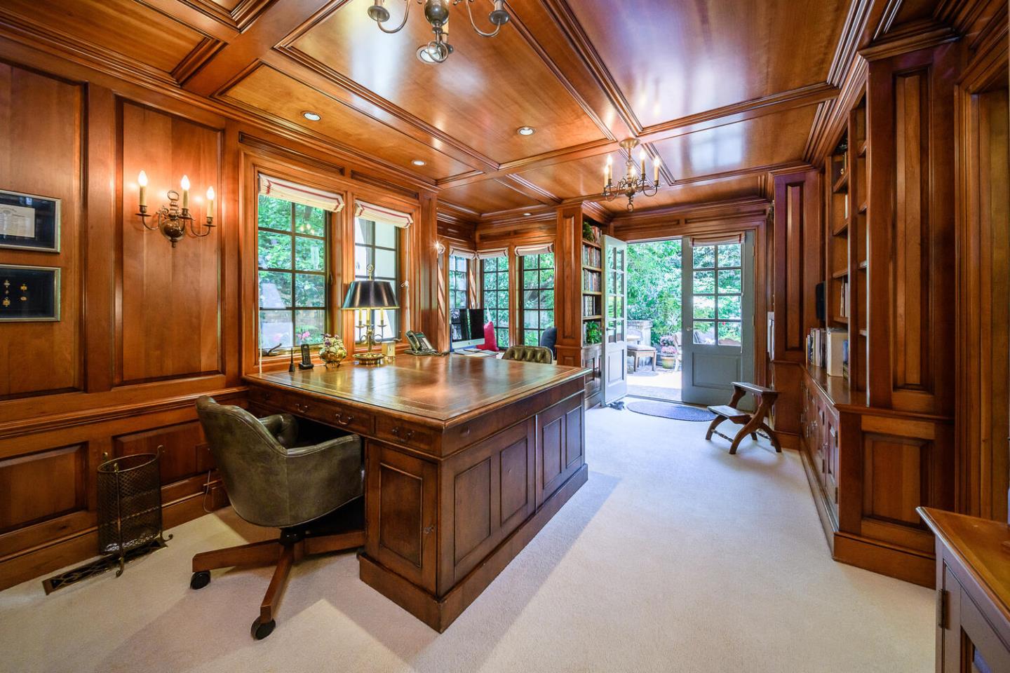 100 Robin Road Hillsborough, CA 94010 - Photo 8 of 90 a open kitchen with stainless steel appliances granite countertop a sink a counter space and a view of living room