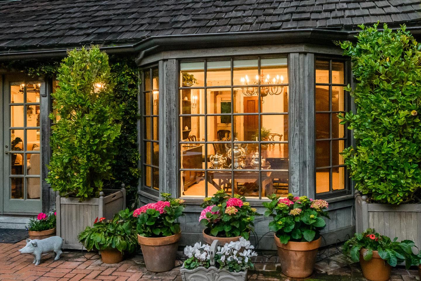 100 Robin Road Hillsborough, CA 94010 - Photo 76 of 90 a view of a porch with a potted plant