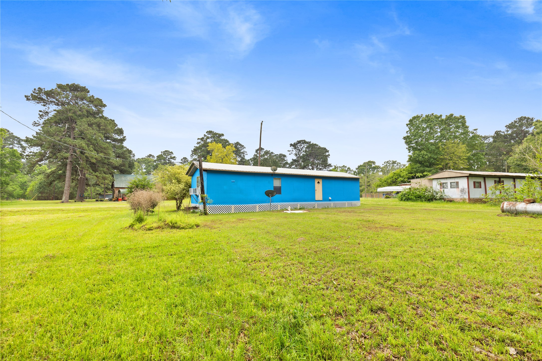 370 Lakeside Drive Trinity, TX 75862 - Photo 16 of 23 a view of a house with a big yard