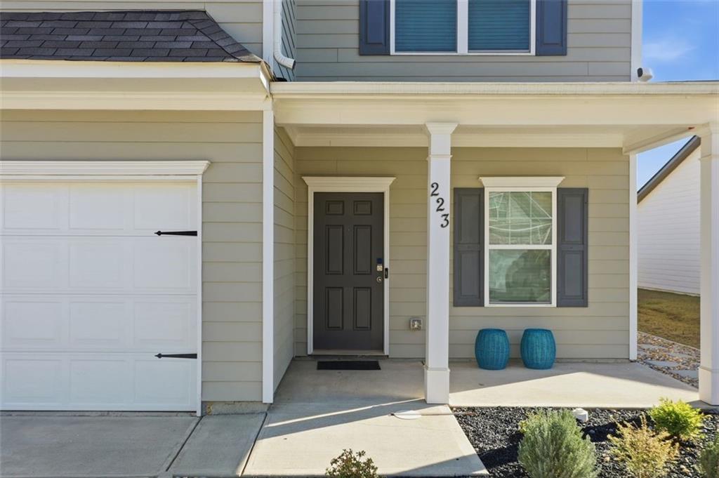 223 Malbone Street Southwest Cartersville, GA 30120 - Photo 4 of 38 a view of a entryway door front of house
