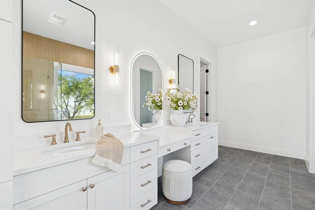 8008 Ben Day Murrin Road Fort Worth, TX 76126 - Photo 18 of 40 a bathroom with a double vanity sink mirror and bathtub