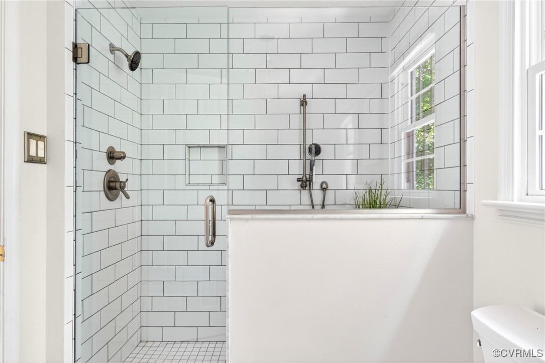 3921 Timber Ridge Road Midlothian, VA 23112 - Photo 28 of 47 a bathroom with a bathtub and shower