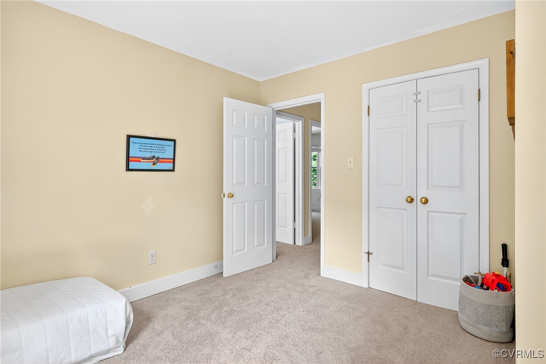3921 Timber Ridge Road Midlothian, VA 23112 - Photo 36 of 47 a bedroom with a bed and a closet