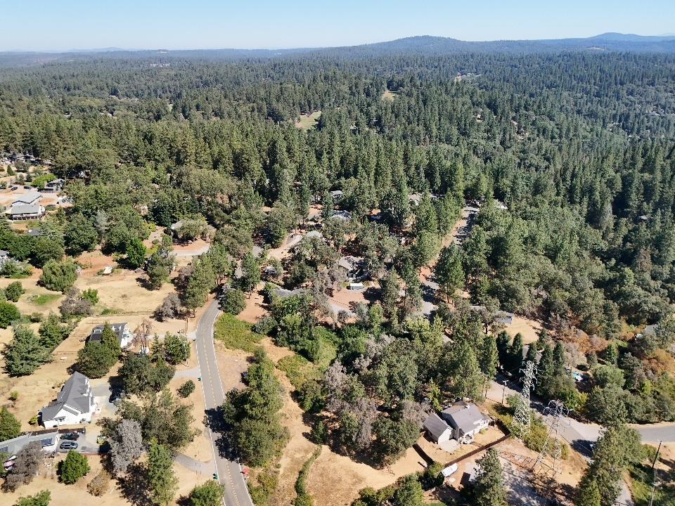 17898 Alexandra Way Grass Valley, CA 95949 - Photo 15 of 23 a view of a city with lush green forest