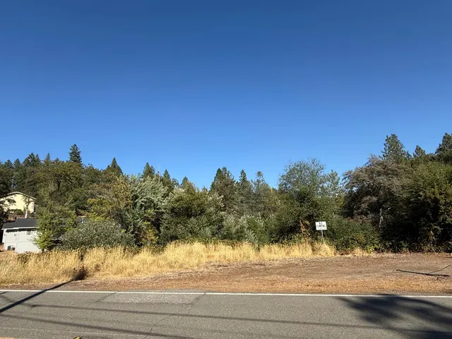 a view of lake with green space