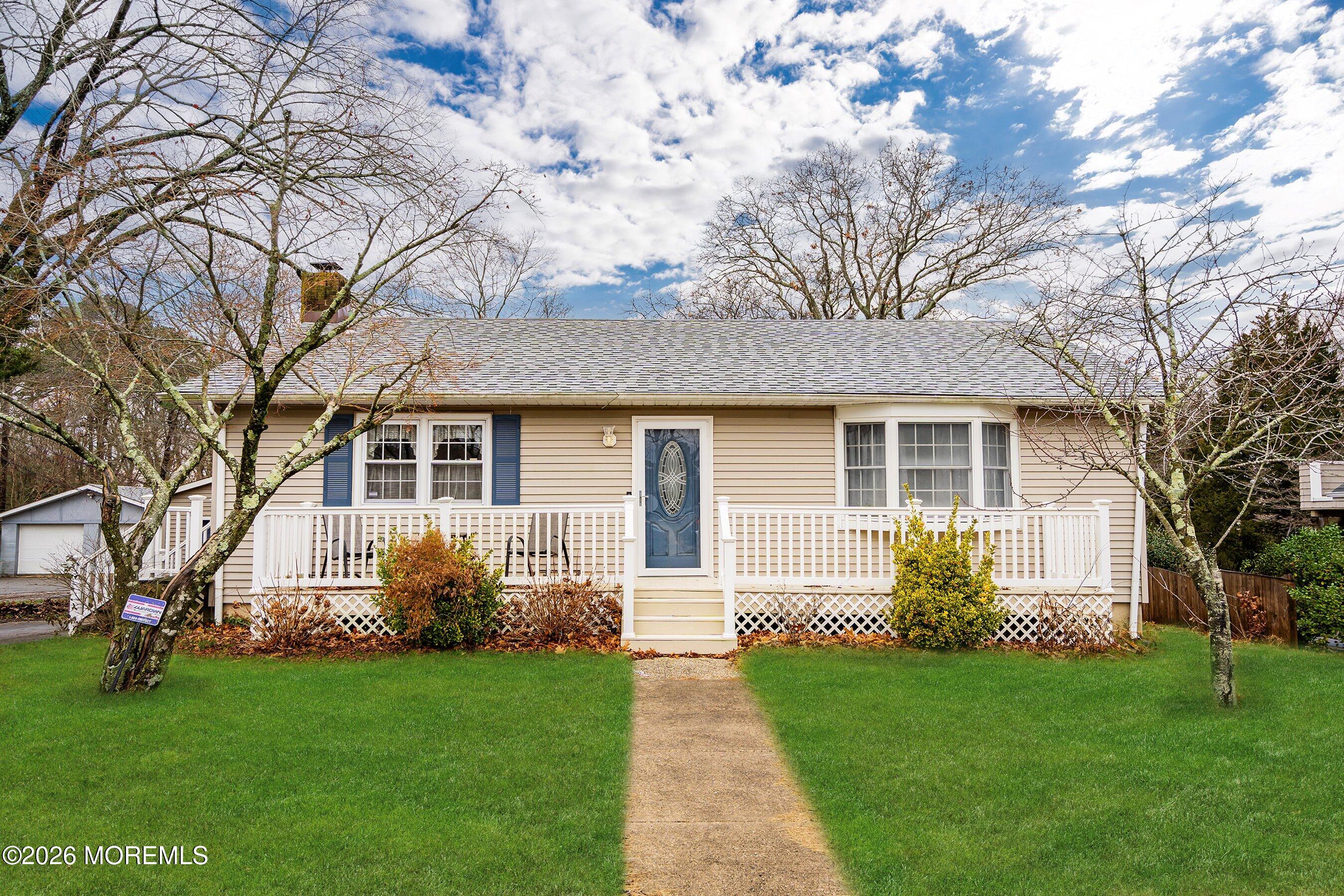 546 Princess Court Toms River, NJ 08753 - Photo 1 of 14 a front view of a house with a garden