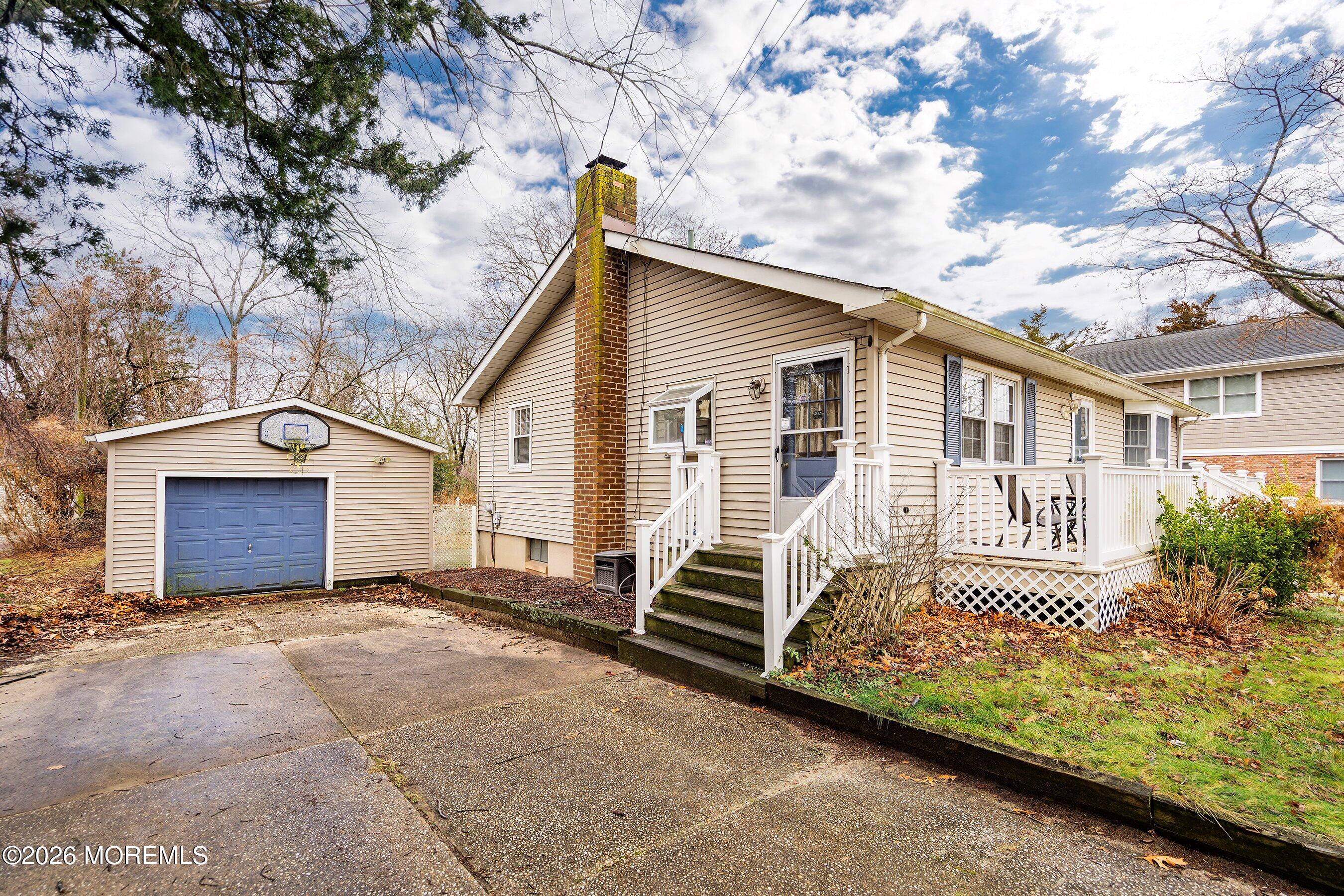 546 Princess Court Toms River, NJ 08753 - Photo 2 of 14 a front view of a house with a yard