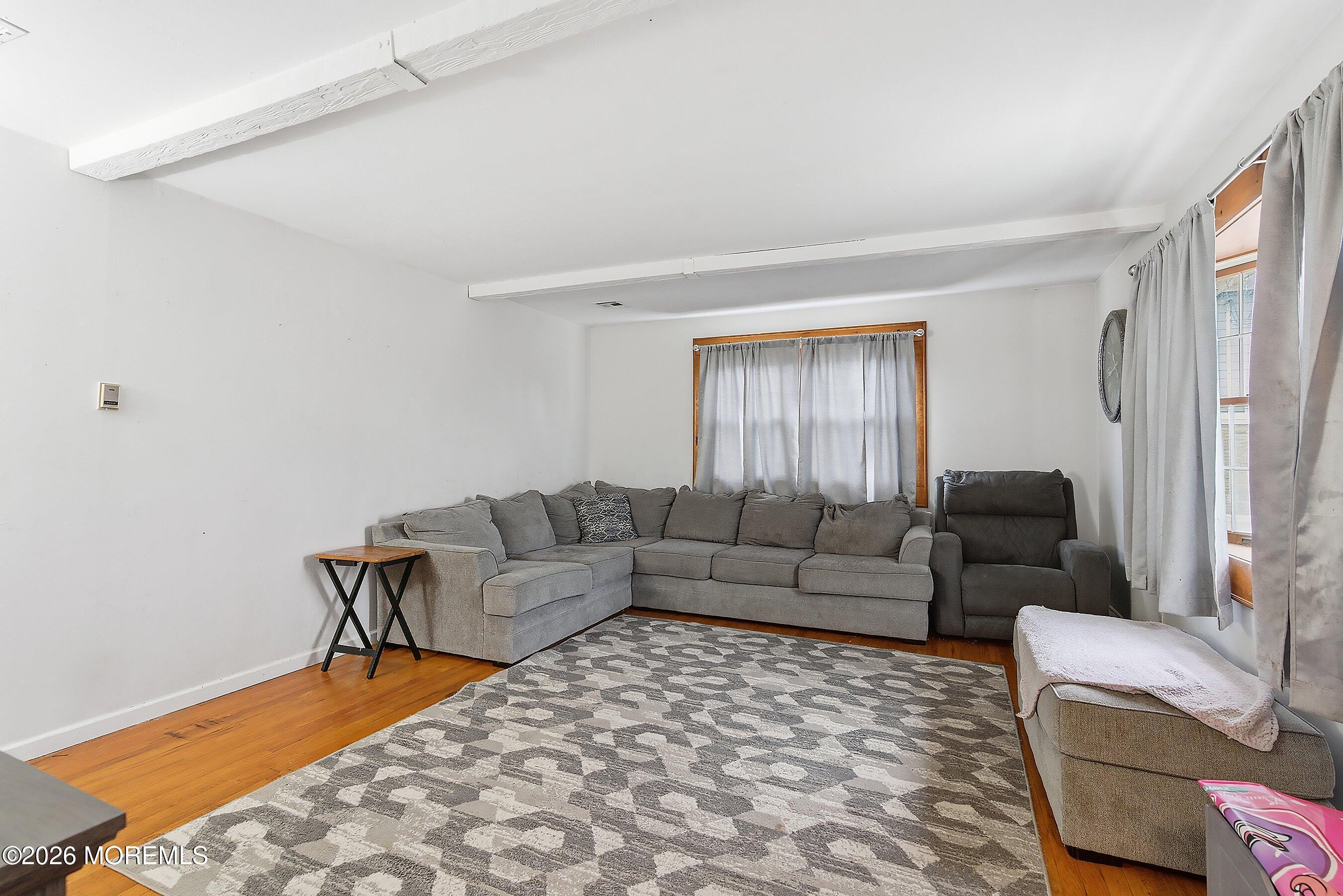546 Princess Court Toms River, NJ 08753 - Photo 4 of 14 a living room with furniture and a couch