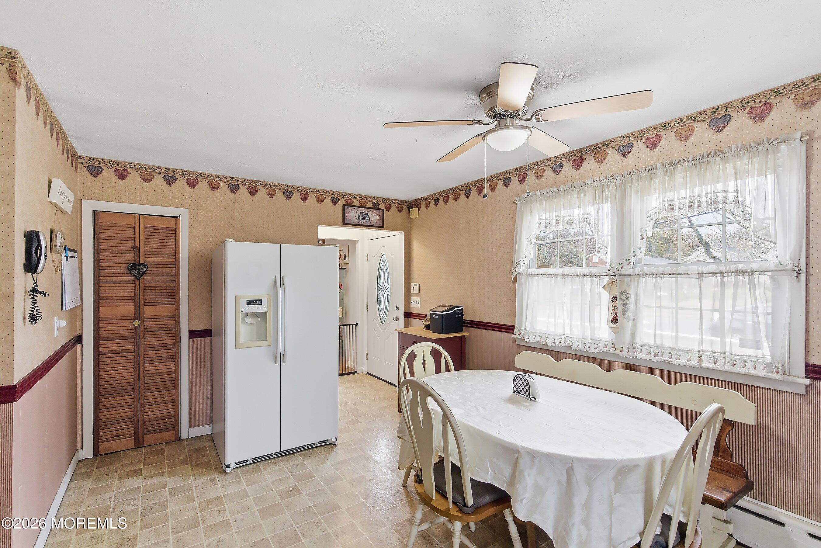 546 Princess Court Toms River, NJ 08753 - Photo 6 of 14 a view of a dining room with furniture window and wooden floor