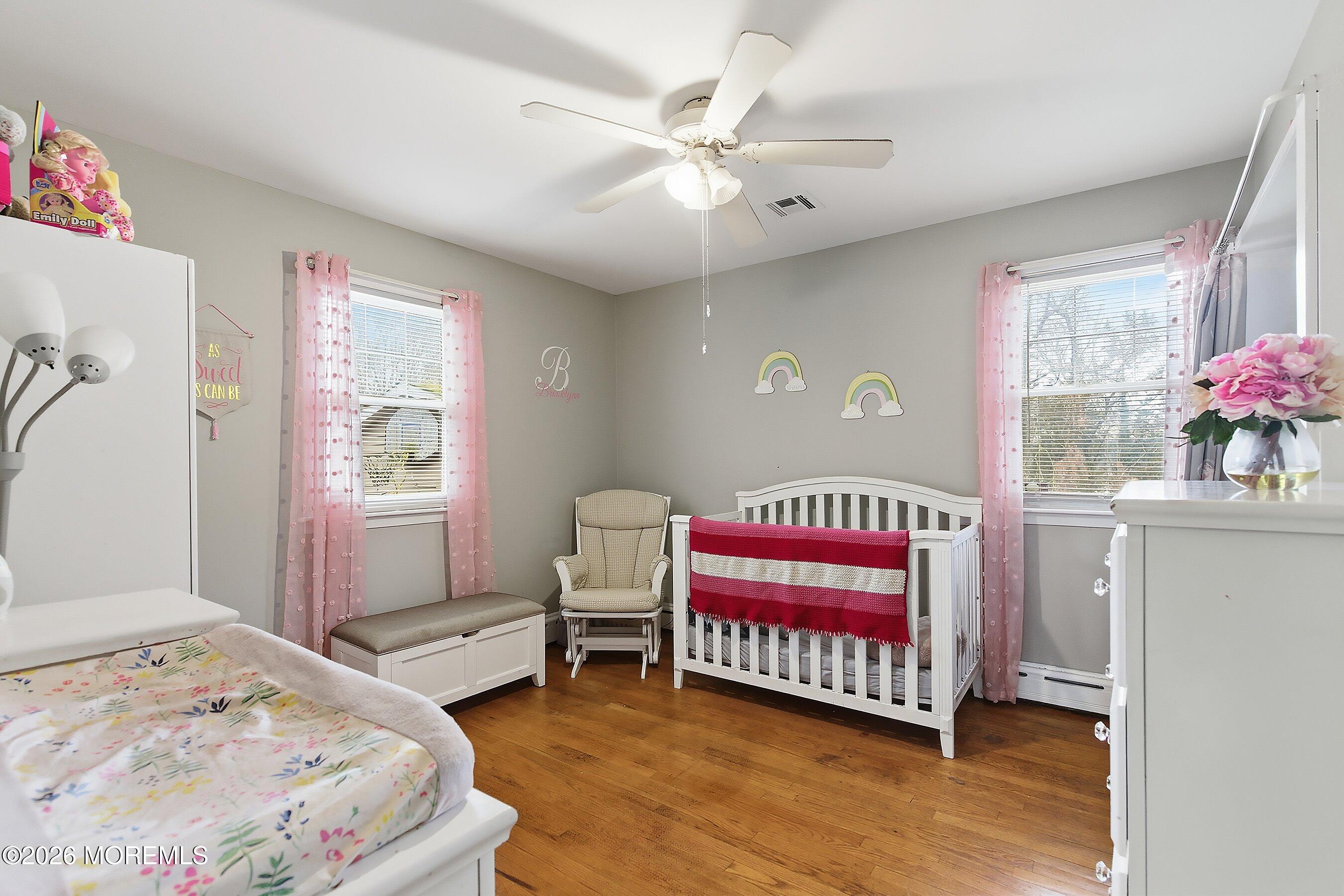 546 Princess Court Toms River, NJ 08753 - Photo 7 of 14 a bedroom with a bed and a window