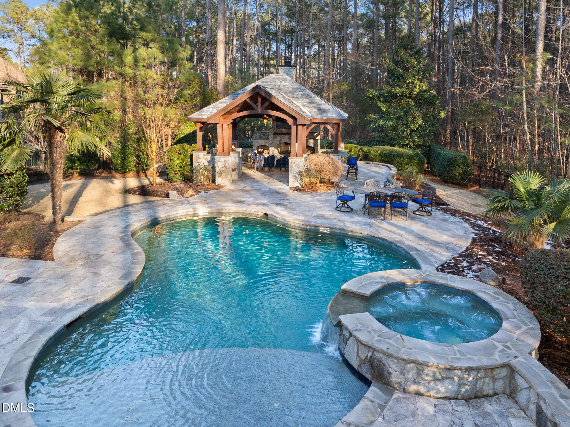 112 Winding Ridge Road Durham, NC 27713 - Photo 1 of 84 a view of a swimming pool with lawn chairs under an umbrella