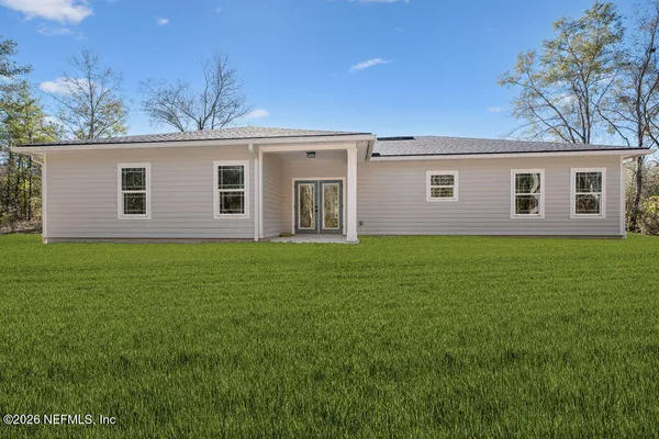 a house view with a garden space