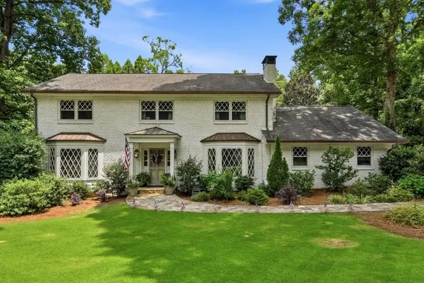 a view of a house with a garden