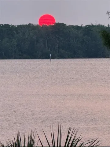a view of a lake with houses