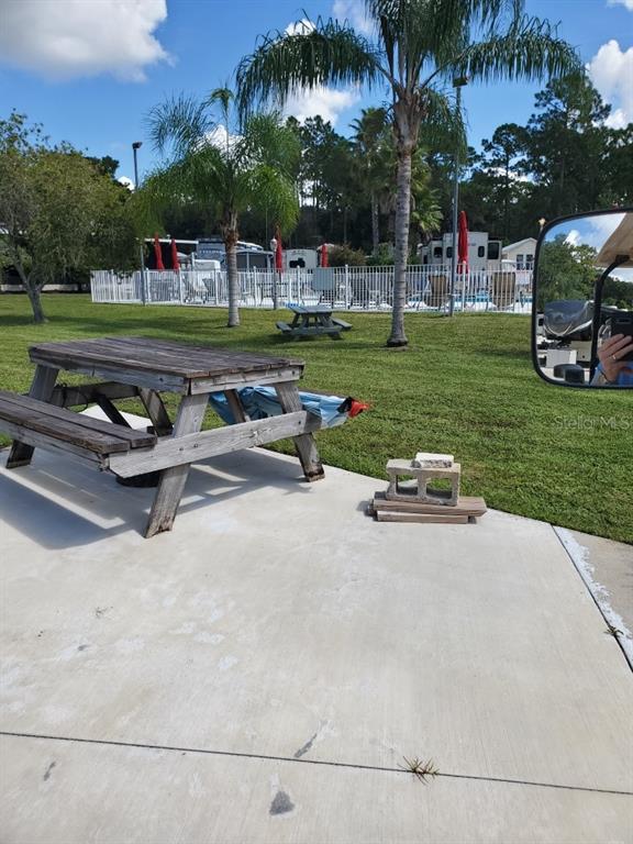 1074 Front Street, Unit 51 Welaka, FL 32193 - Photo 4 of 27 a view of a park with swings and slides