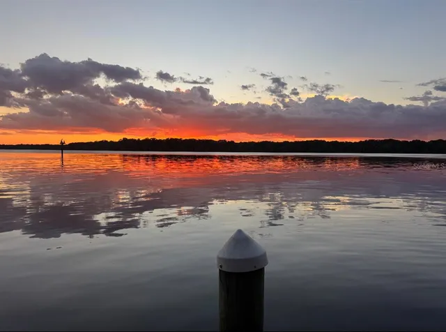 a view of a lake with a house