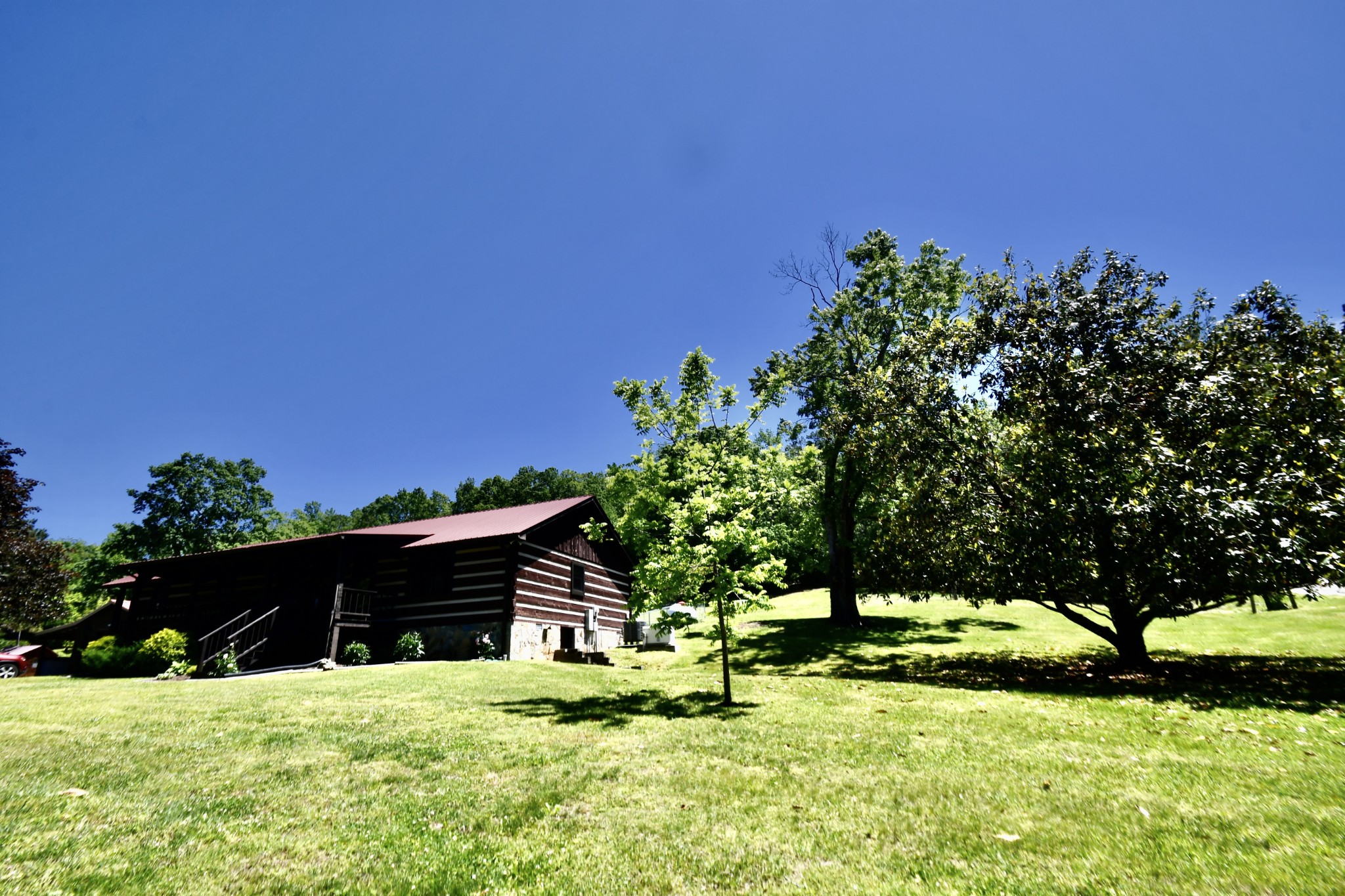 1342 Aetna Church Road Centerville, TN 37033 - Photo 47 of 59 a backyard of a house with lots of green space