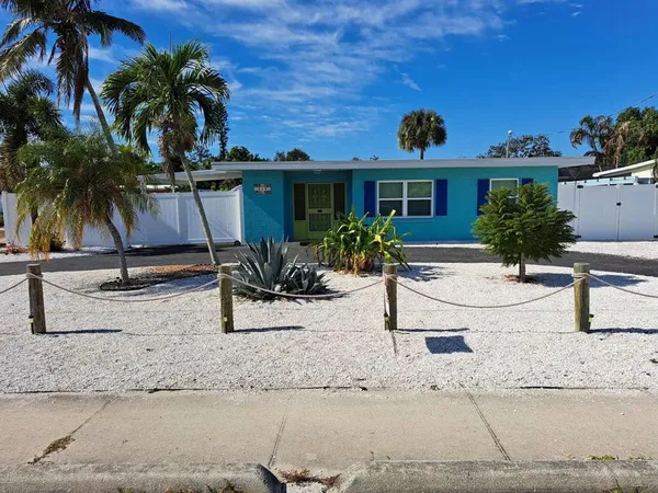 a view of a backyard with a patio