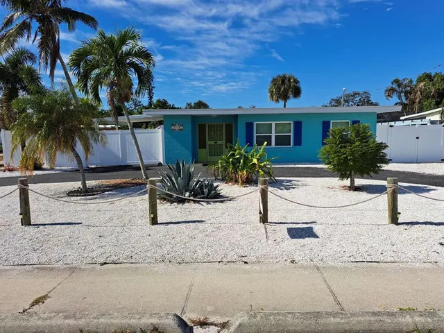 a view of a backyard with a patio