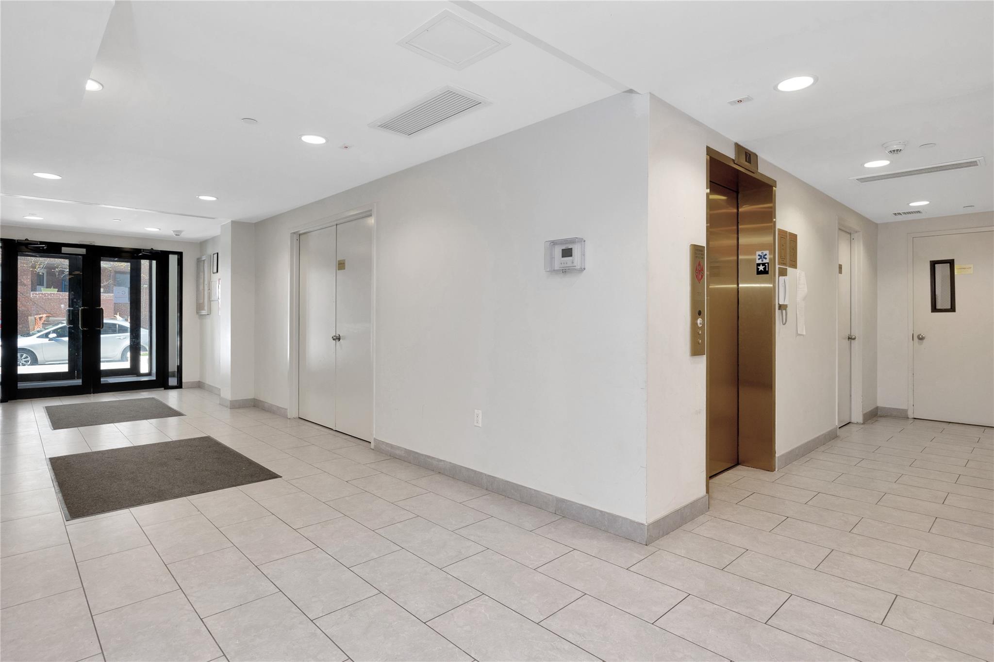 148-36 89th Avenue, Unit 3C Queens, NY 11435 - Photo 19 of 27 Community lobby featuring visible vents