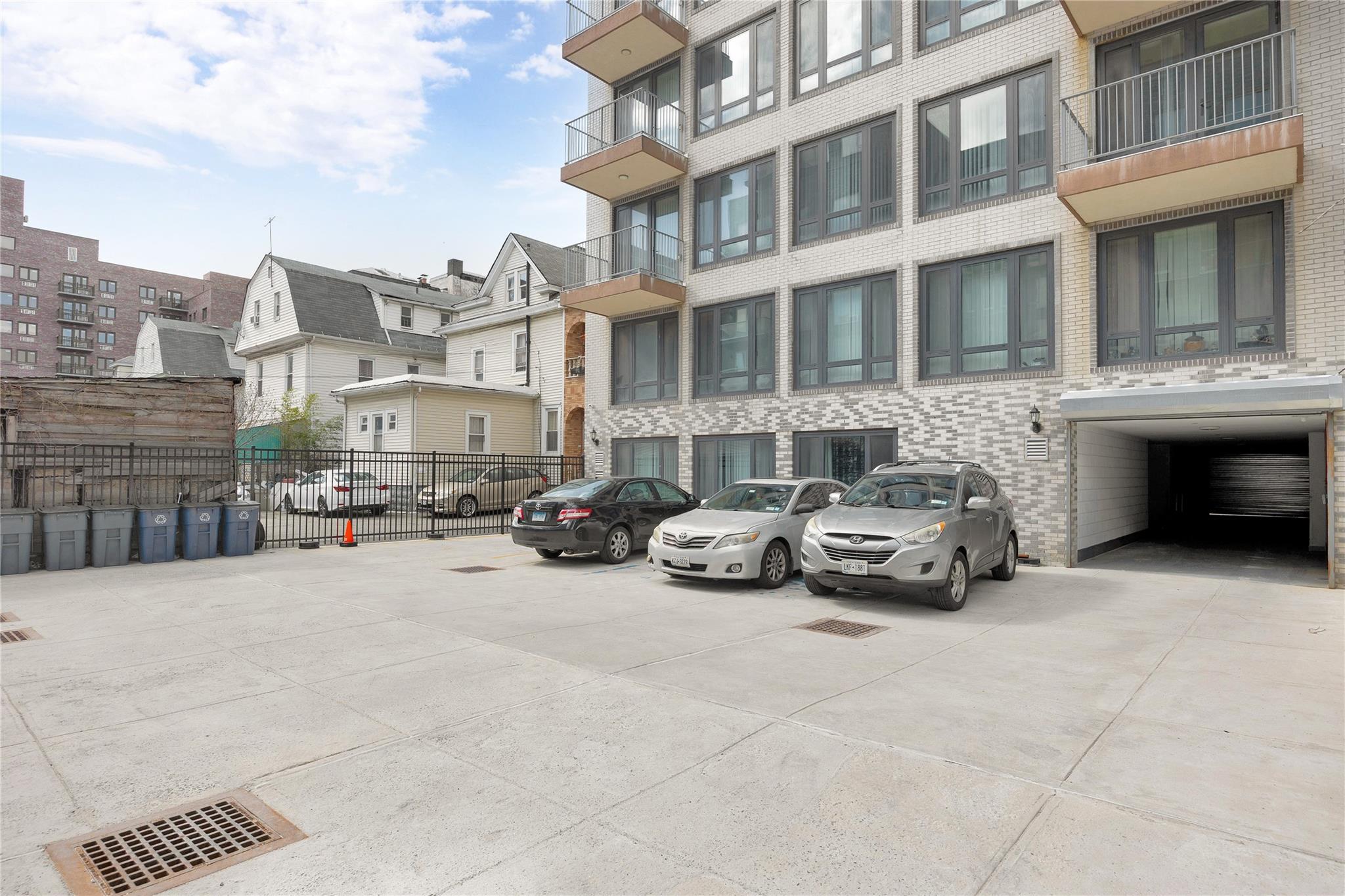 148-36 89th Avenue, Unit 3C Queens, NY 11435 - Photo 24 of 27 View of property with fence