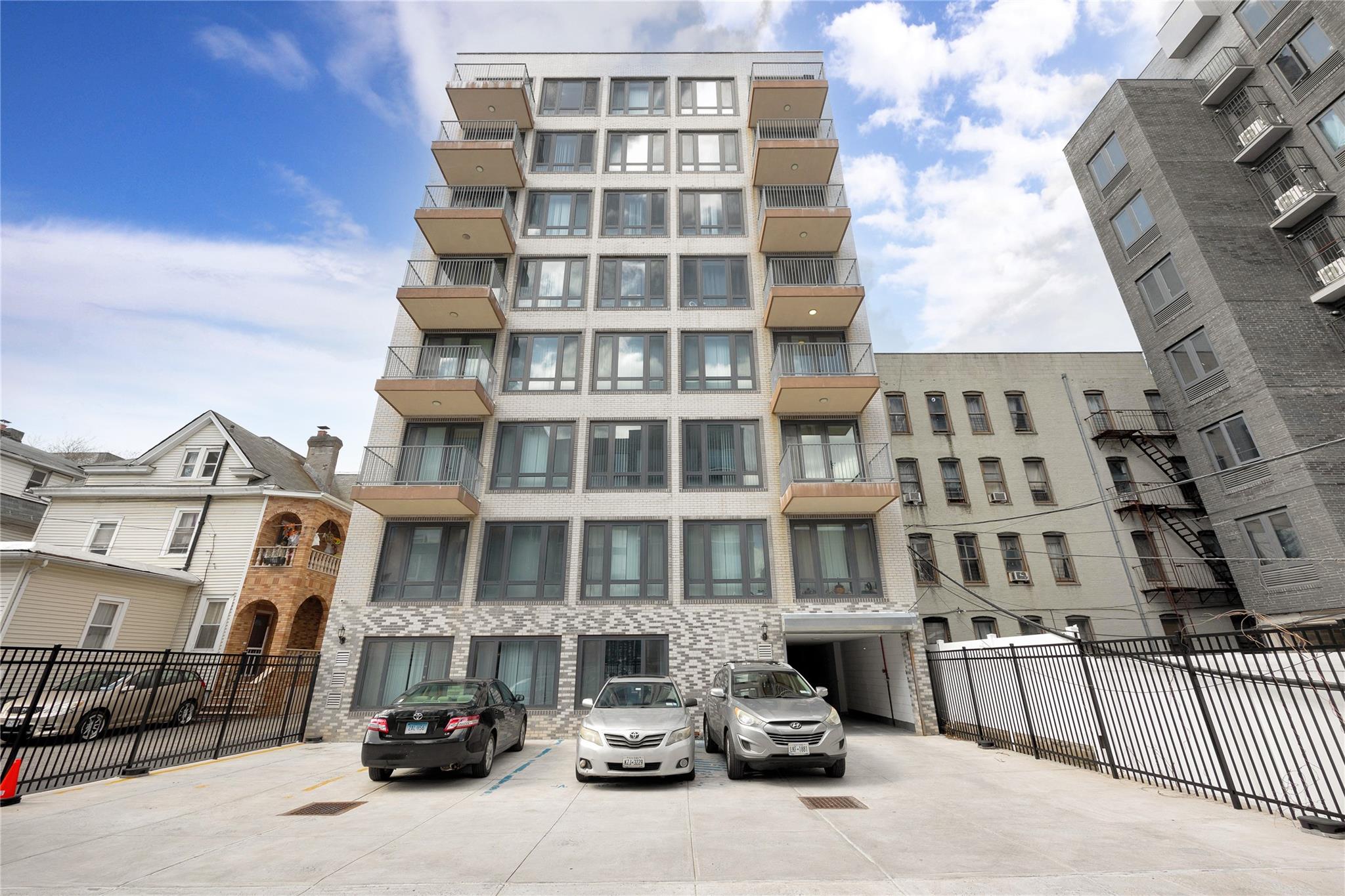 148-36 89th Avenue, Unit 3C Queens, NY 11435 - Photo 27 of 27 View of property with fence