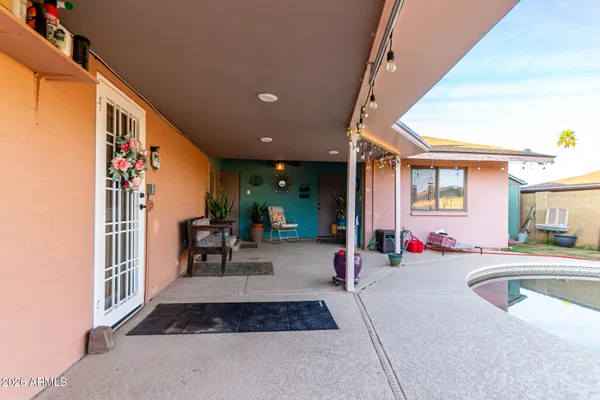 a view of backyard with trampoline