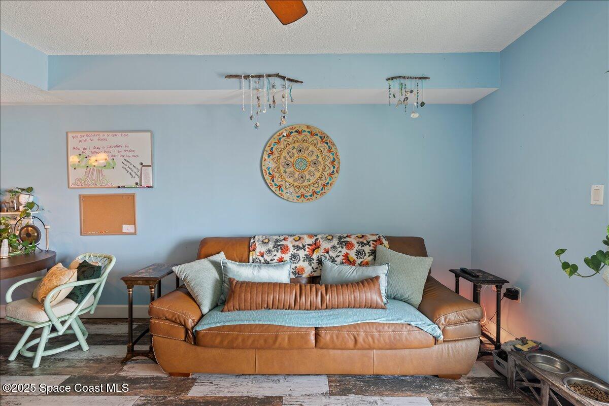 199 Florida A1A, Unit D201 Satellite Beach, FL 32937 - Photo 15 of 39 a living room with furniture