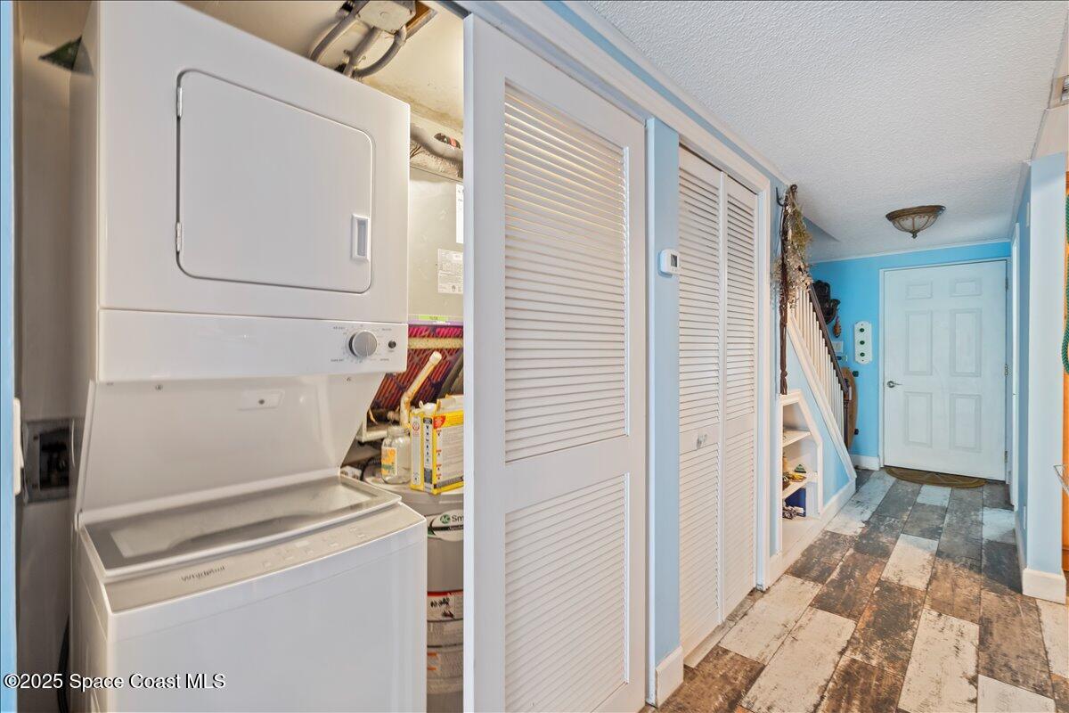 199 Florida A1A, Unit D201 Satellite Beach, FL 32937 - Photo 16 of 39 a view of storage and utility room
