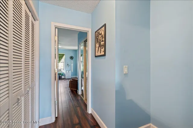a sitting room with furniture and a chandelier