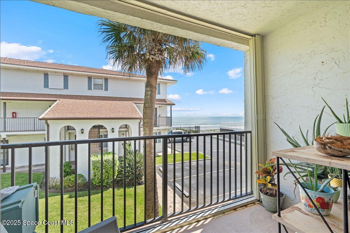 199 Florida A1A, Unit D201 Satellite Beach, FL 32937 - Photo 31 of 39 a view of a balcony with plants