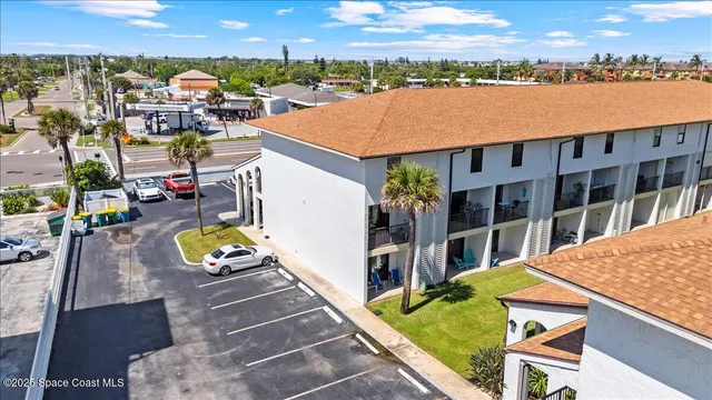 a view of balcony with furniture