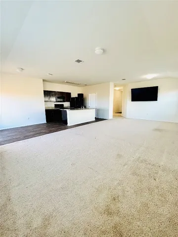 a view of kitchen and microwave