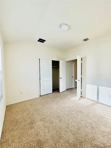 a view of a room with a fireplace