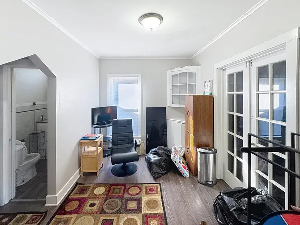 a kitchen with stainless steel appliances a refrigerator and a stove