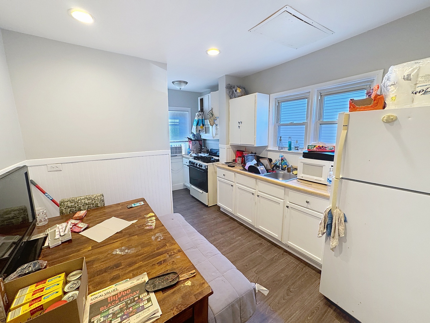 2748 11th Avenue Moline, IL 61265 - Photo 6 of 16 a kitchen with stainless steel appliances a refrigerator sink and cabinets