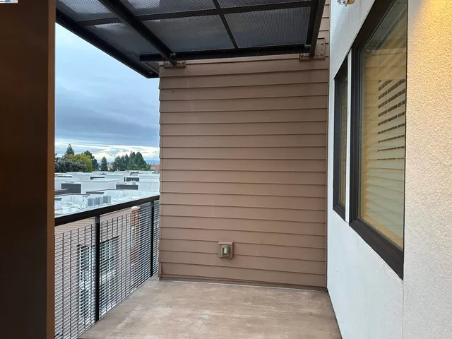 a view of a door and a window