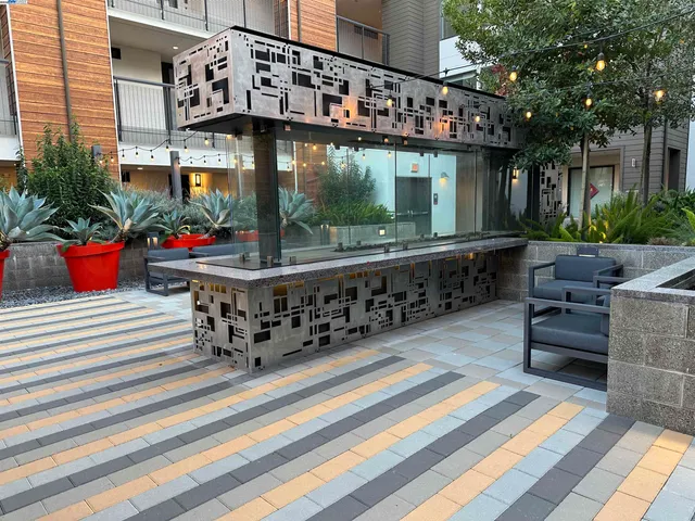 a glass door with outdoor seating