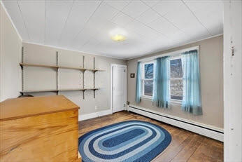 44 Holmes Road Dedham, MA 02026 - Photo 17 of 24 a room with a bed and a window