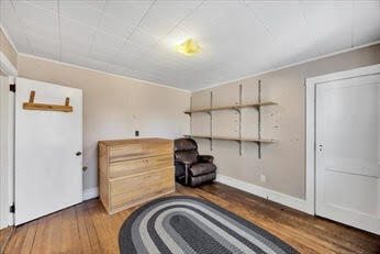 44 Holmes Road Dedham, MA 02026 - Photo 19 of 24 a bedroom with a bed and a window in it