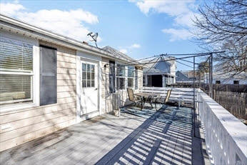 44 Holmes Road Dedham, MA 02026 - Photo 22 of 24 a front view of a house with a large window